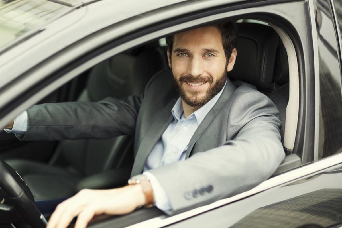 Man Driving Car Window